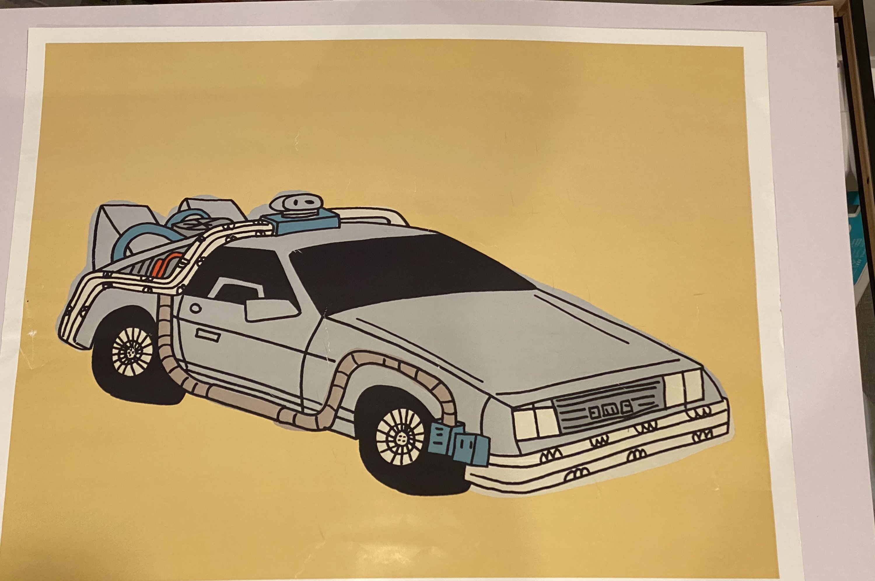 Rare Marz Jr. signed pop art of DMC DeLorean, framed and colorful, showcasing nostalgic design.